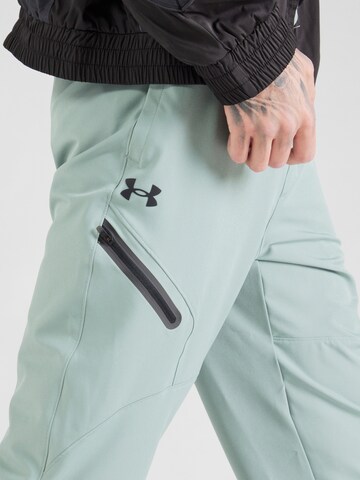 UNDER ARMOUR Tapered Sportbroek 'Unstoppable' in Groen