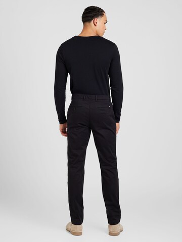 TOMMY HILFIGER - Regular Calças chino 'Denton' em preto