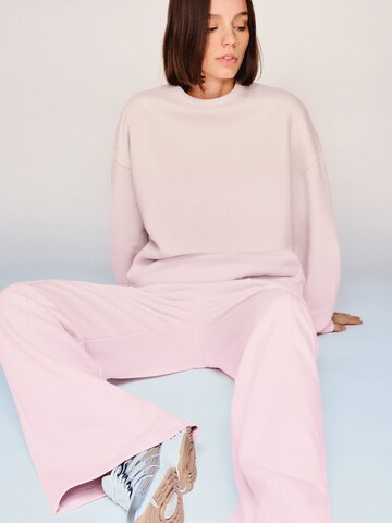 Bershka Wide Leg Housut värissä vaaleanpunainen