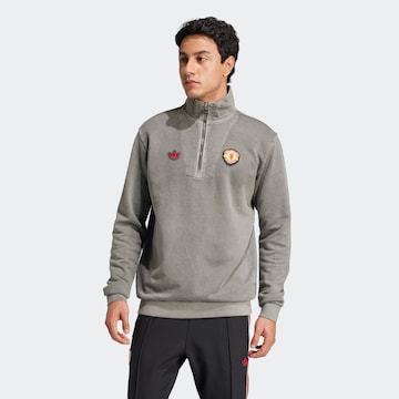 ADIDAS ORIGINALS Mikina 'Manchester United Terrace Icons' - Sivá: predná strana