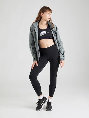 Skinny Pantaloni sportivi 'ONE' di NIKE in nero