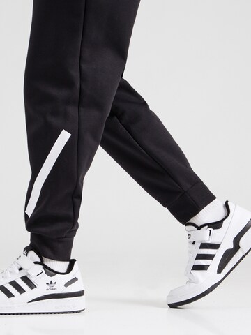 Tapered Pantaloni sportivi 'Z.N.E.' di ADIDAS SPORTSWEAR in nero