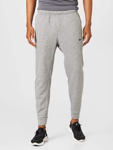 NIKE Tapered Sportbroek in Grijs: voorkant