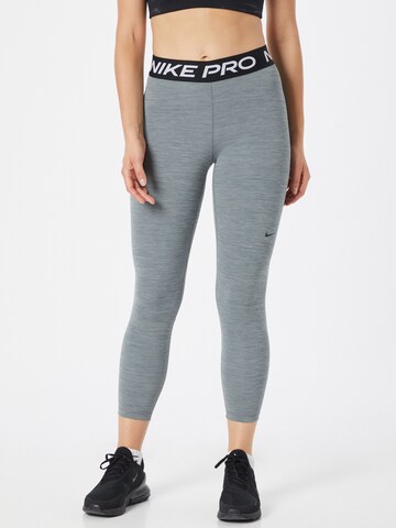 NIKE - Skinny Pantalón deportivo en gris: frente