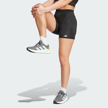 ADIDAS PERFORMANCE - Skinny Pantalón deportivo 'Own the Run' en negro: frente
