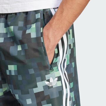 ADIDAS ORIGINALS Конический (Tapered) Спортивные штаны 'Аdidas Originals x Minecraft' в Зеленый