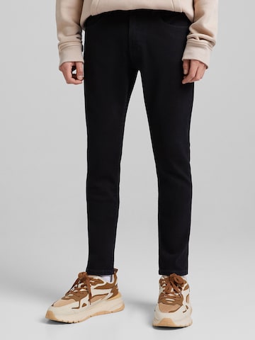 Bershka Skinny Jeans in Black: front