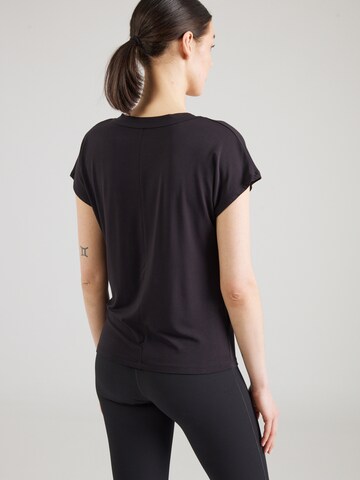 CURARE Yogawear - Camisa funcionais em preto
