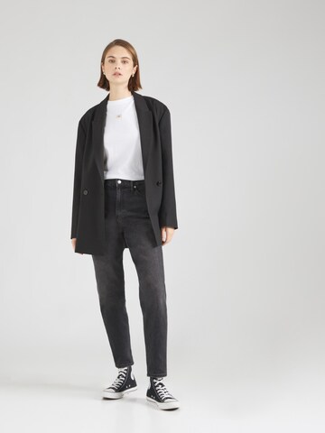 Calvin Klein Jeans Tapered Jeans i svart