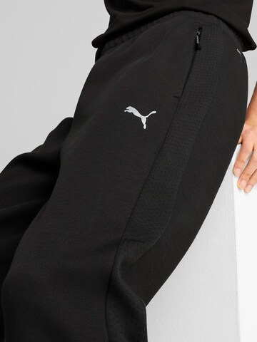 Coupe slim Pantalon de sport 'Evostripe' PUMA en noir