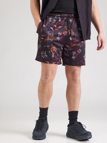 PUMA Regular Byxa 'FLORAL SPORT' i svart: framsida