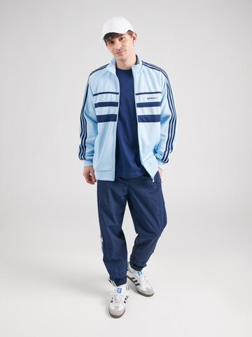 ADIDAS ORIGINALS - Sudadera con cremallera 'The First' en azul
