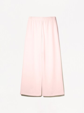 Bershka Wide Leg Housut värissä vaaleanpunainen