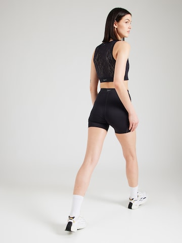 Reebok - regular Pantalón deportivo en negro