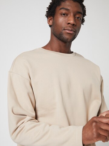 ABOUT YOU x Louis Darcis - Sudadera en beige