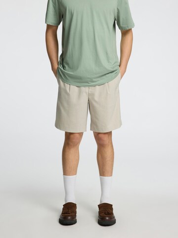 Regular Pantalon à pince 'SLHLeroy' SELECTED HOMME en beige : devant