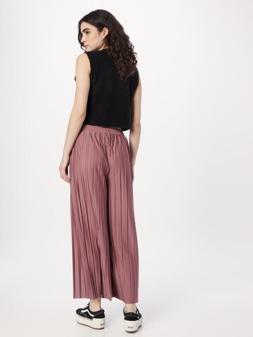 ABOUT YOU Wide leg Trousers 'Caren Trousers' in Pink