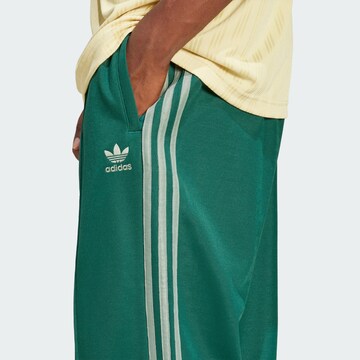 Baggy Pantaloni 'Adicolor Firebird' di ADIDAS ORIGINALS in verde