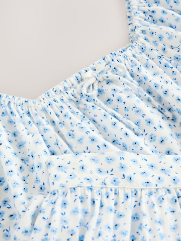 Set Next en bleu