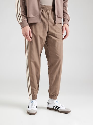 ADIDAS ORIGINALS Zwężany krój Spodnie 'Adicolor Firebird' w kolorze zielony: przód