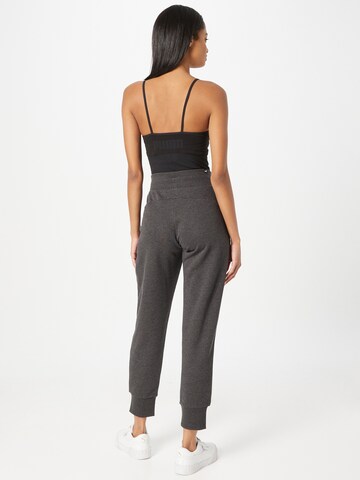 PUMA - Tapered Calças de desporto 'ESSENTIAL' em cinzento