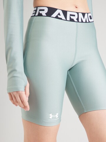 UNDER ARMOUR Skinny Sportbroek 'Authentics' in Groen