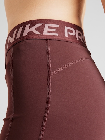 lillā NIKE Šaurs Sporta bikses