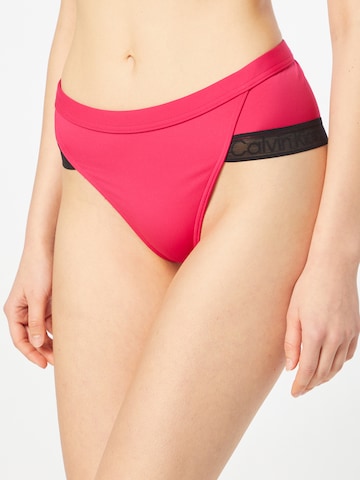 Calvin Klein Swimwear Bikini hlačke 'BRAZILIAN' | roza barva: sprednja stran
