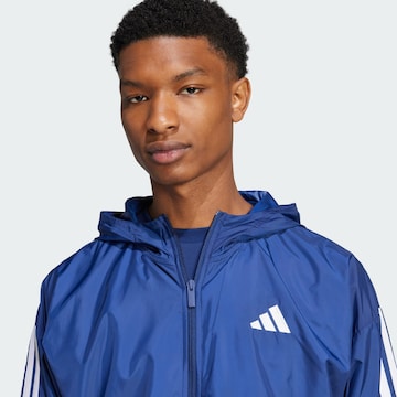 ADIDAS SPORTSWEAR - Chaqueta deportiva 'Essentials' en azul
