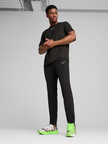 PUMA Regular Sportbroek 'PUMA x HYROX CLOUDSPUN' in Zwart