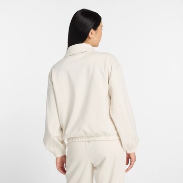 Veste en polaire fonctionnelle new balance en beige