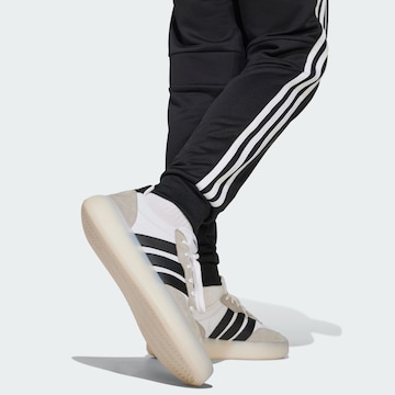 ADIDAS PERFORMANCE Tapered Sportbyxa 'Tiro 25 Essentials' i svart