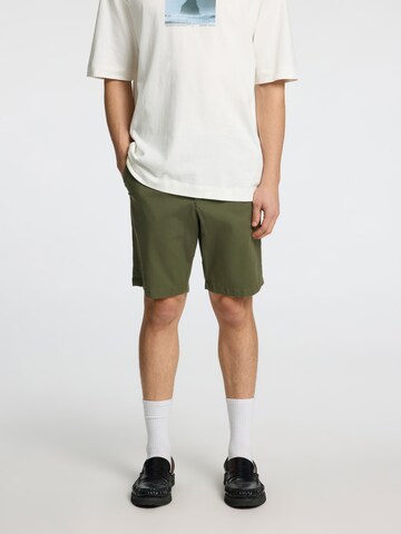 Slimfit Pantaloni eleganți 'SLHMiles' de la SELECTED HOMME pe verde: față